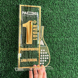 Trofeo en acrilico transparente con detalles en acrilico dorado espejo y grabado - 13 cm x 25 cm (C73586)